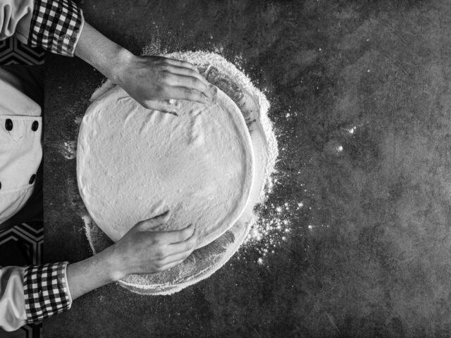 hands-making-pizza-dough-with-flour hands-making-pizza-dough-with-flour